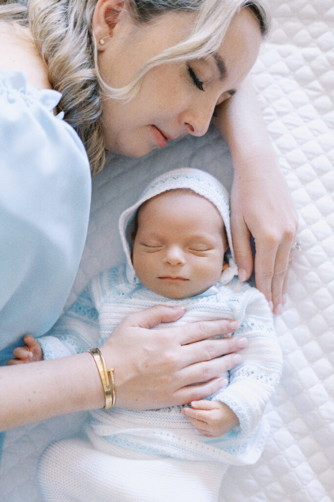 Mckinney momma holding Newborn in lifestyle photos 