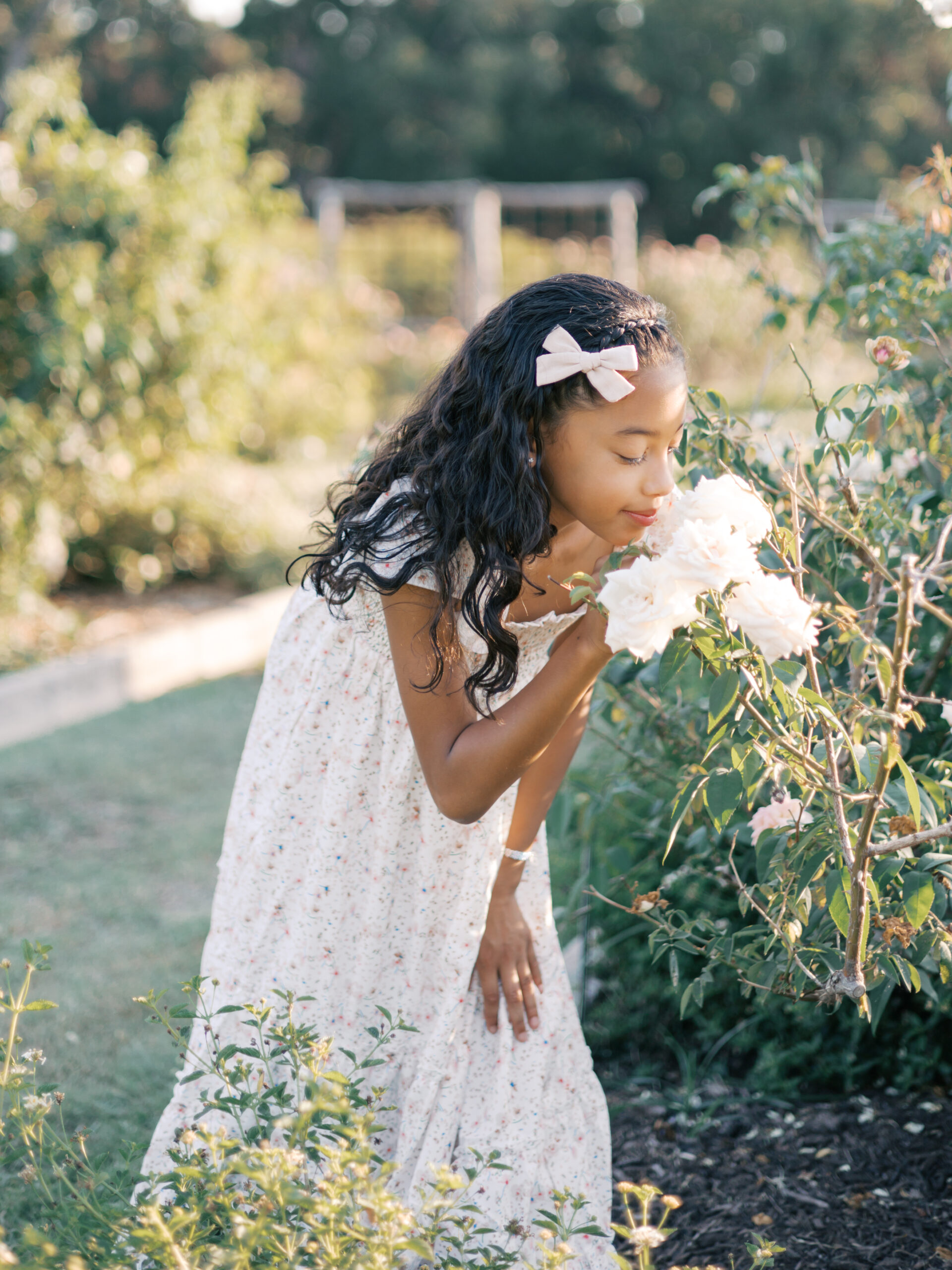 birthday girl turns 9 years old and celebrates with a photo session at a rose garden